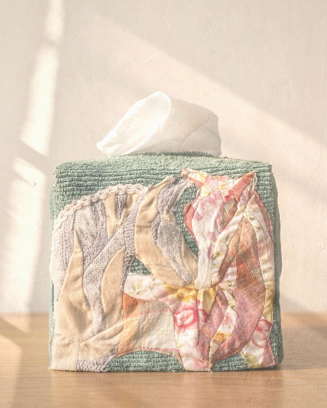 Textile tissue case composed from reclaimed garments and production remnants, HorngWave, 2026.