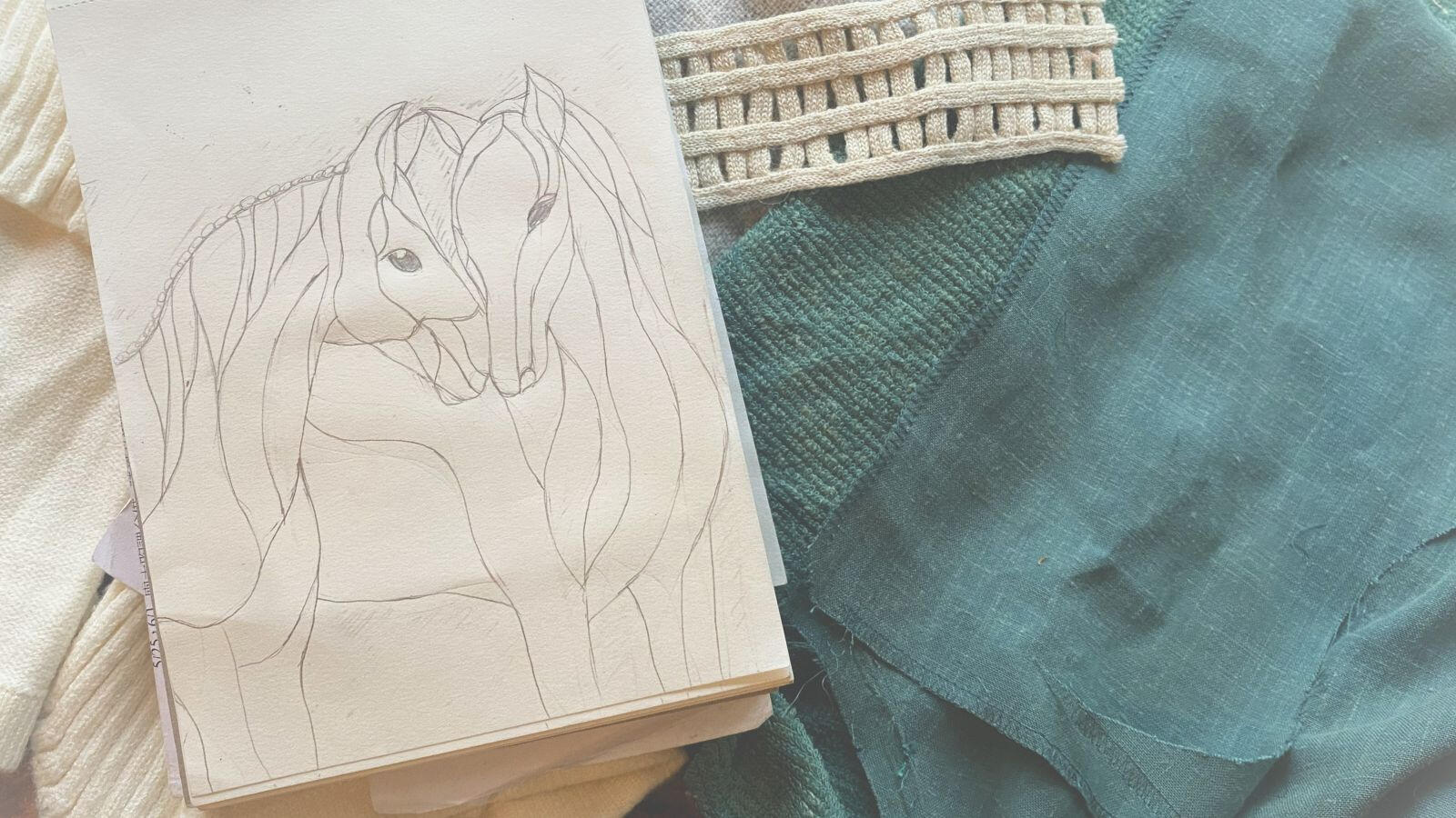 Original garment materials and design sketches used in the development of Walking Together.